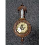 A Victorian walnut barometer/thermometer