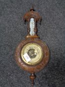 A Victorian walnut barometer/thermometer