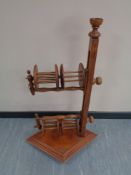 A mid century pine double wool winder stand