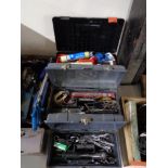 Three plastic tool boxes containing tools