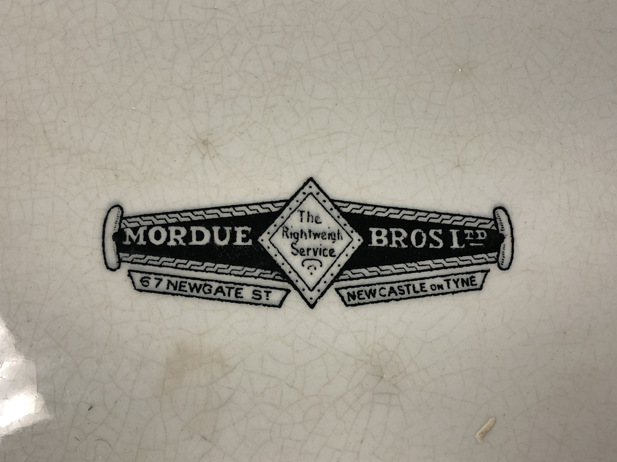 A Victorian white pottery shop display slab for Mordue Bros. Ltd. of 67 Newgate St. - Image 14 of 14