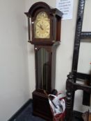 A reproduction regulator grandmother clock