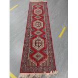 A traditional style Afghan carpet runner,