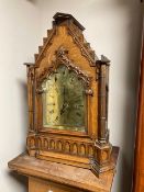 A late nineteenth century Gothic revival oak bracket clock, with Westminster eight bell chime,