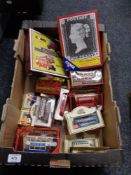 A box of die cast models of yesteryear,