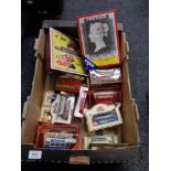 A box of die cast models of yesteryear,