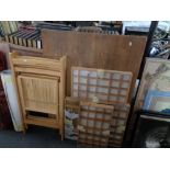 Two beech folding chairs together with three wall display cases,