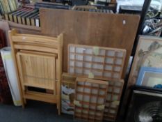 Two beech folding chairs together with three wall display cases,