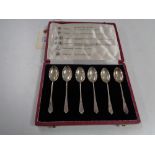 A set of six silver teaspoons representing the six hallmarks of London, Chester, Edinburgh, Glasgow,