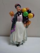 A Royal Doulton figure - Biddy Penny Farthing,