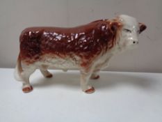 A large china model of a Hereford bull