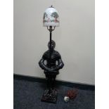 An early twentieth century lamp in the form of a knight