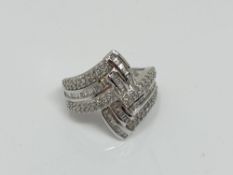 A 9ct gold diamond set ring, size N CONDITION REPORT: 4.