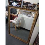 A gilt framed bevelled mirror