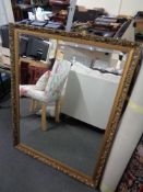 A gilt framed bevelled mirror