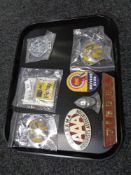 A collection of car badges - AA, Diesel,