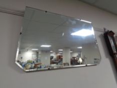 An Edwardian frameless mirror