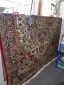 A large machine made fringed Eastern carpet CONDITION REPORT: 250 cm x 340 cm