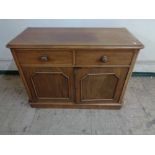 A Victorian mahogany side cabinet fitted with two drawers