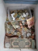 A box of world coins and bank notes