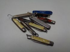 Ten small pocket / pen knives