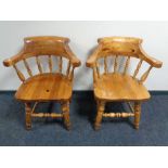 A pair of pine armchairs