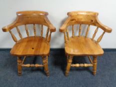 A pair of pine armchairs