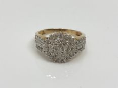 A 9ct gold diamond set cluster ring, size P CONDITION REPORT: 3.