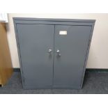 A mid century metal double door office cabinet, width 92 cm.