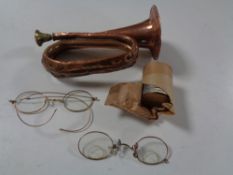 A miniature copper and brass bugle, antique spectacles,