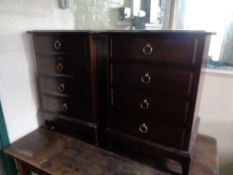 A pair of Stag four drawer bedside chests