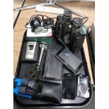 A tray of 16 x 50 Tasco binoculars, Garmin satnav, Canon digital camera, Samsung telephone,