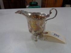 A silver cream jug, Birmingham 1921, 58.1g.