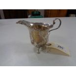 A silver cream jug, Birmingham 1921, 58.1g.