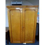 A Victorian oak double door wardrobe