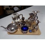 A four piece silver plated tea service together decorative epergne and other silver plated items.