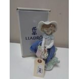 A Lladro figure - Pretty Pickings, 05222, boxed.