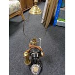 An early 20th century candlestick telephone/lamp