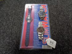 A Slimwatch in retail packaging together with two Gent's stainless steel Accurist watches