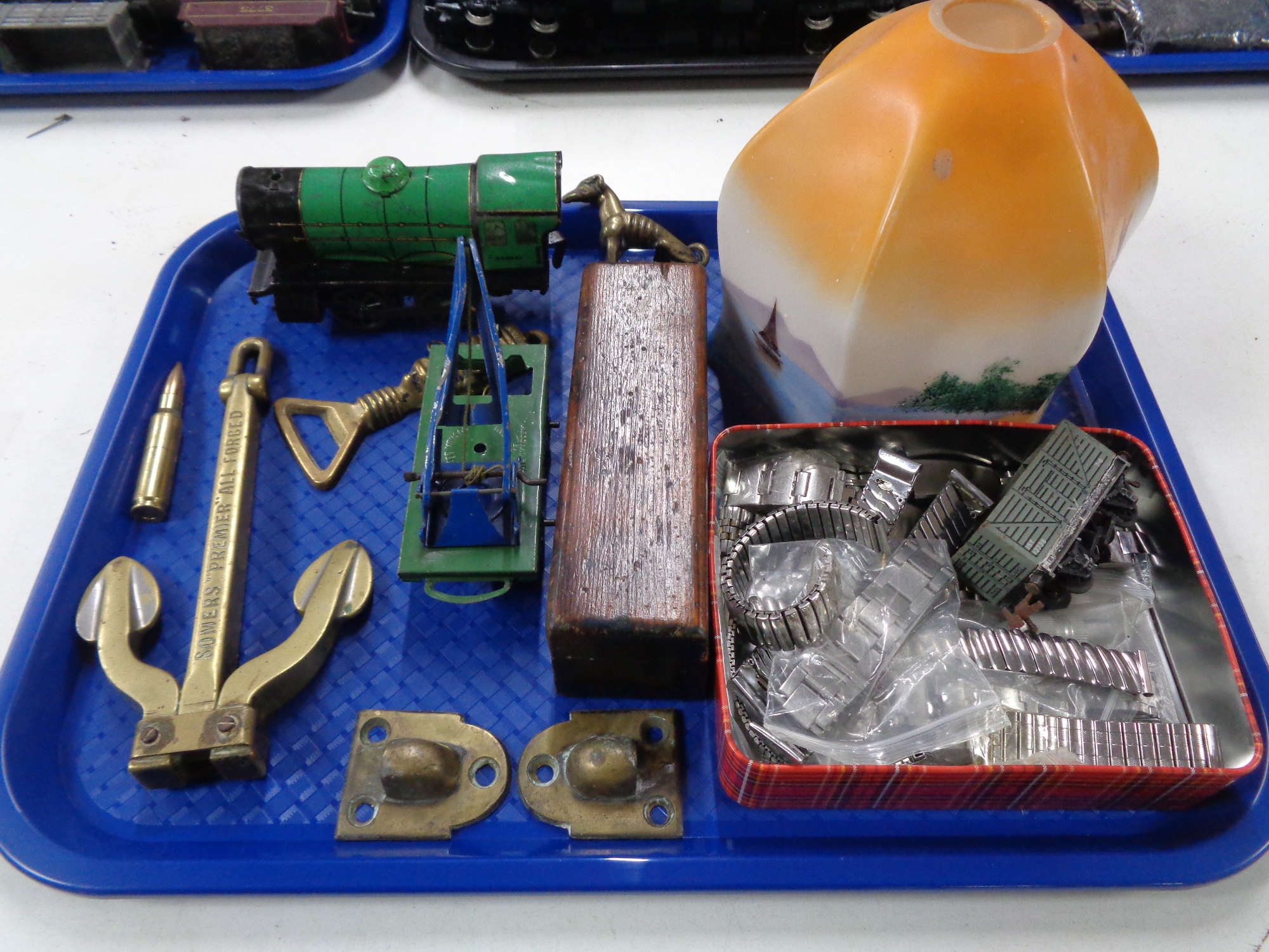 A tray of vintage glass ceiling light, tin plated Hornby locomotive engine, brass anchor,