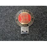 A vintage motor car badge - USSO Cumberland group, United Steel Company.