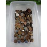 A large plastic crate of UK and world coins