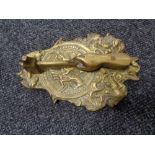 A nineteenth century brass door knocker