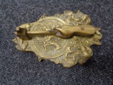 A nineteenth century brass door knocker