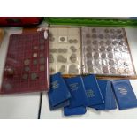 A folder of coins, UK and world coins,