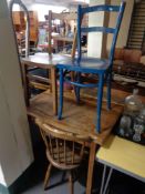 An Ibex chair together with two further kitchen chairs and wooden table