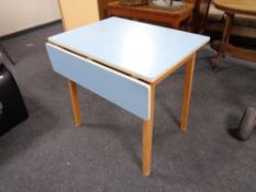 A mid century melamine topped table together with antique stool and chair