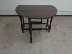 A nineteenth century oak gateleg table