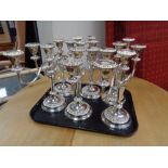 A tray of six silver plated candelabra