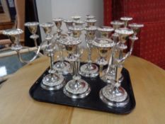 A tray of six silver plated candelabra